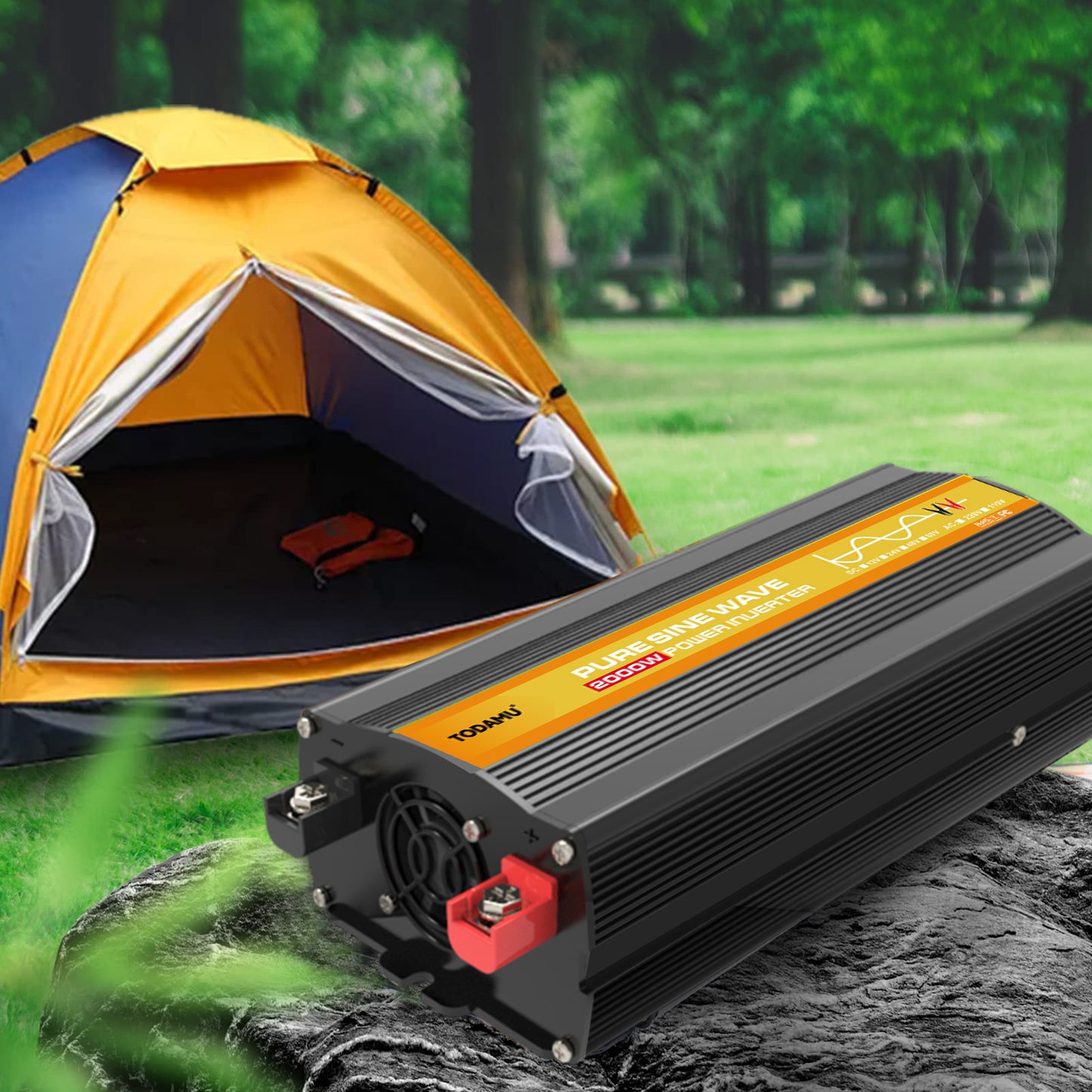 Power inverter on a rock with a tent in the background