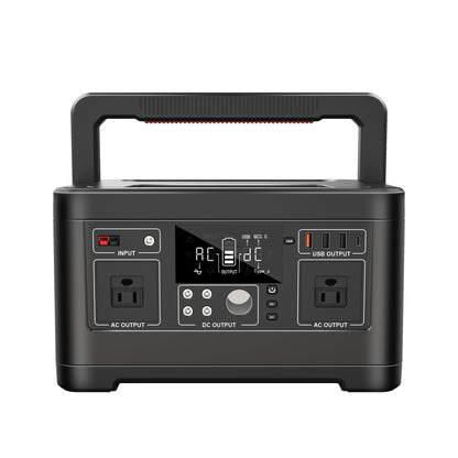 Black portable power station with multiple outlets and display on a white background